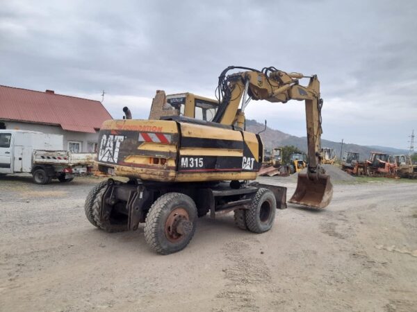 Caterpillar M 315 - imagine 2